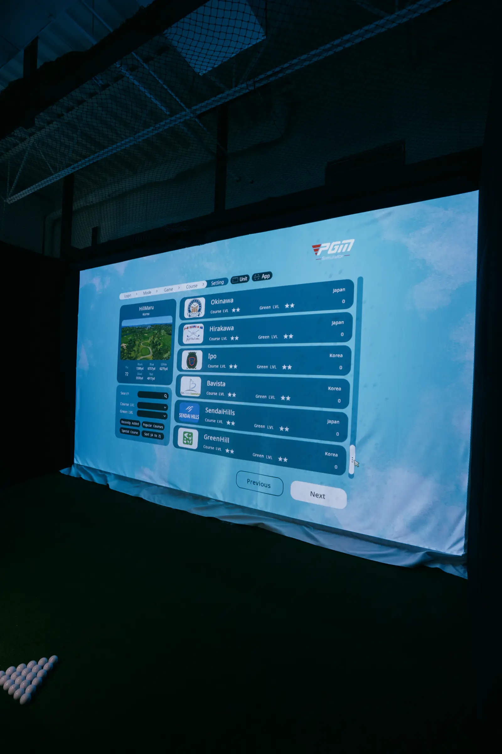 A PGM simulator screen showing the course menu, seen from the hitting area